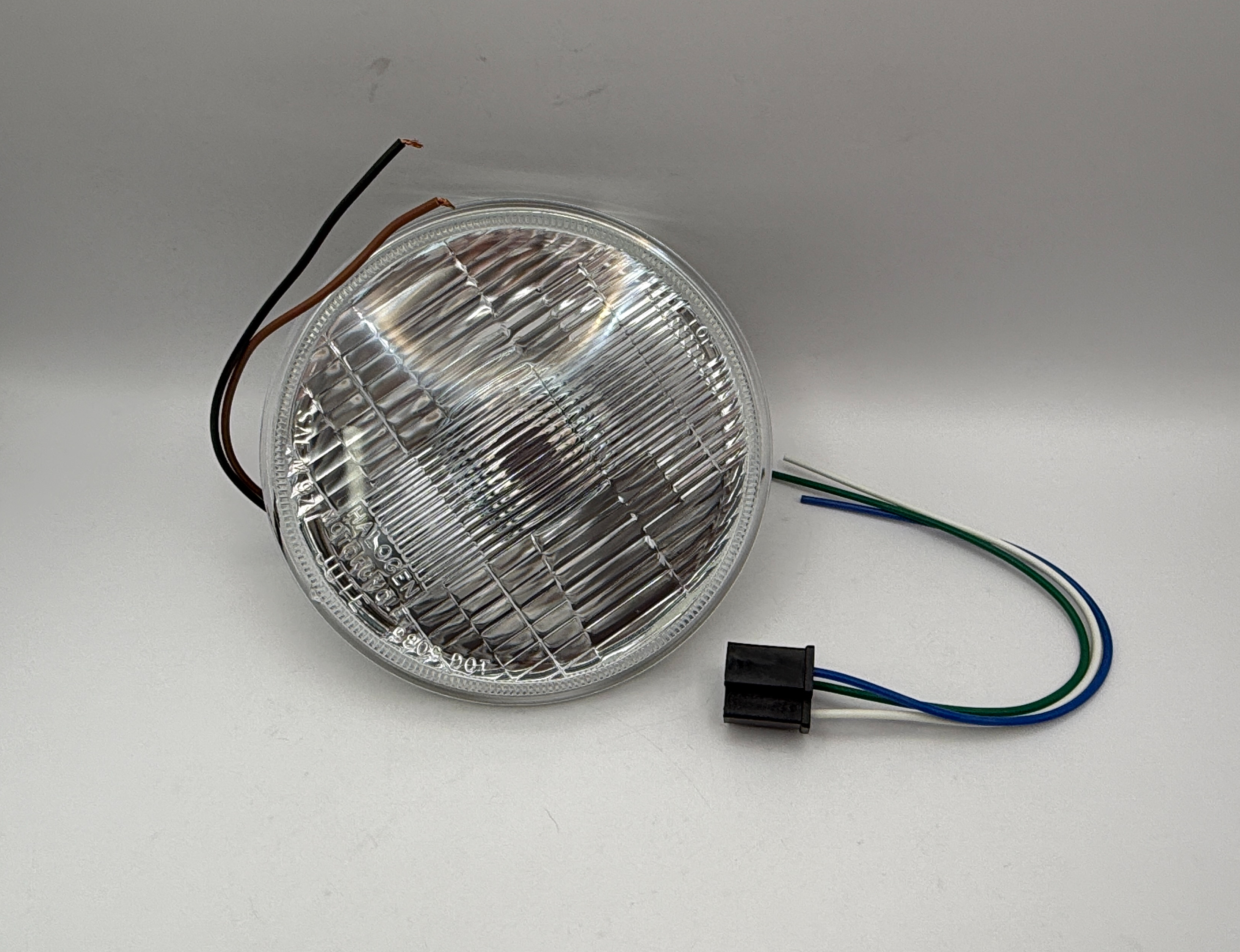 Hendler Headlight Glass & Reflector With Side Light Bulb 560550H, 560560H